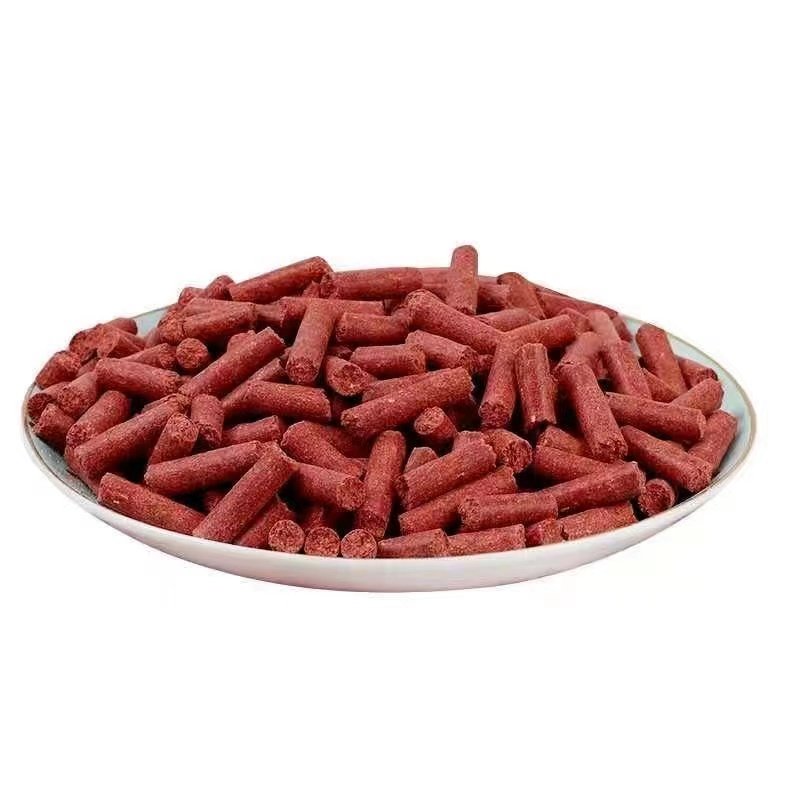 Red worm greasy earthworm pellets are gushing out of a black hole to feed the grubfish and grassfish