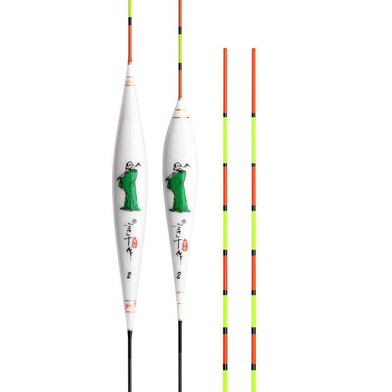 Ea series of Peacock Feather Carp buoys, floating in black pits