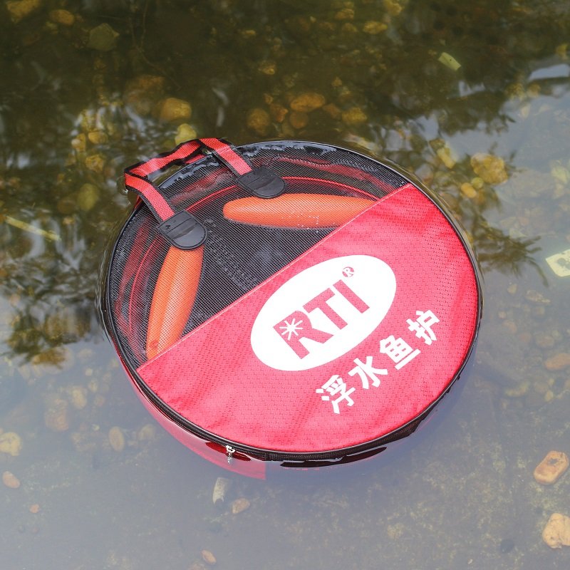 POCKET OF T-FI, RUBBER-COATED WATER DRUMS, WITH A BAG OF FISH AND A BARREL OF FISH