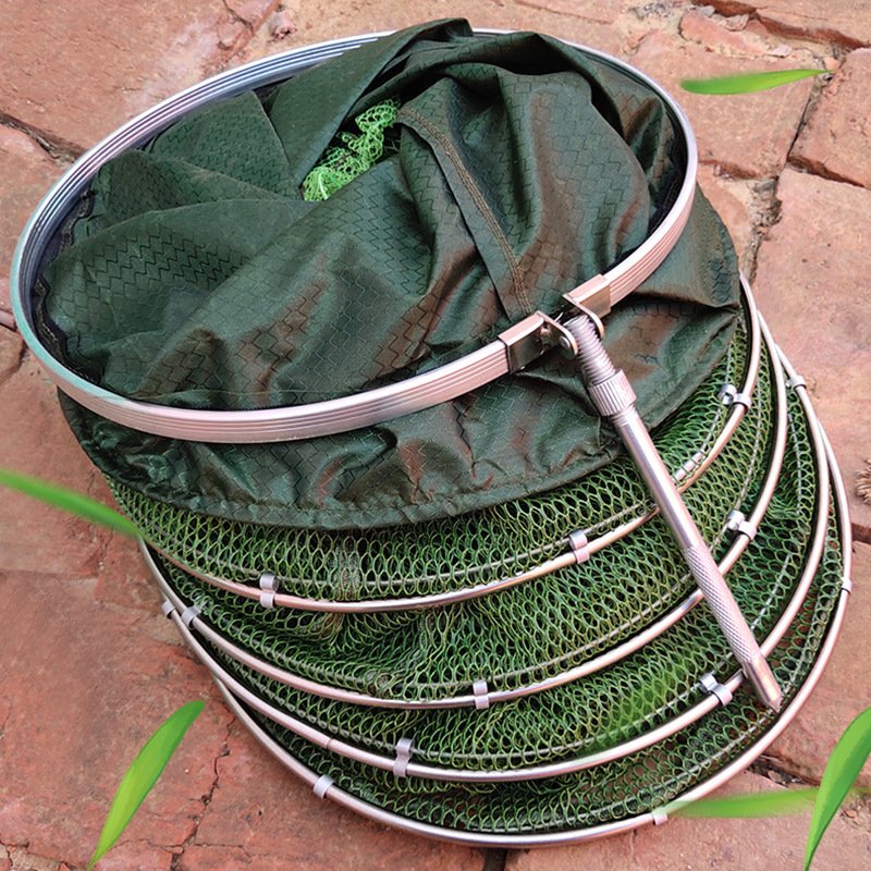 The thicker fish guard, the green double-ring black pits, the net-covered, stainless steel double-ring