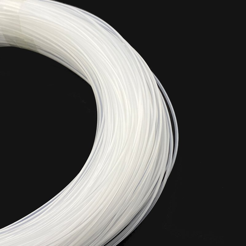 A fishing boat's line of translucent twirling, single-wielding, large-number super-coarse nylon kite