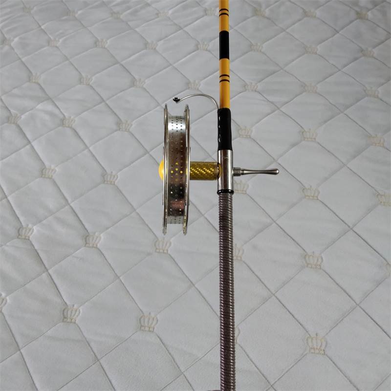 A porcelain conductor full of three-and-a-half-metre super-thirty-seven-moder carbon-condensed fishing pole