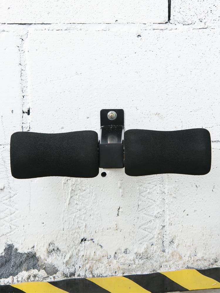The wall of the wall is lying on the legs, the legs rack up, the auxiliary of the sitting up