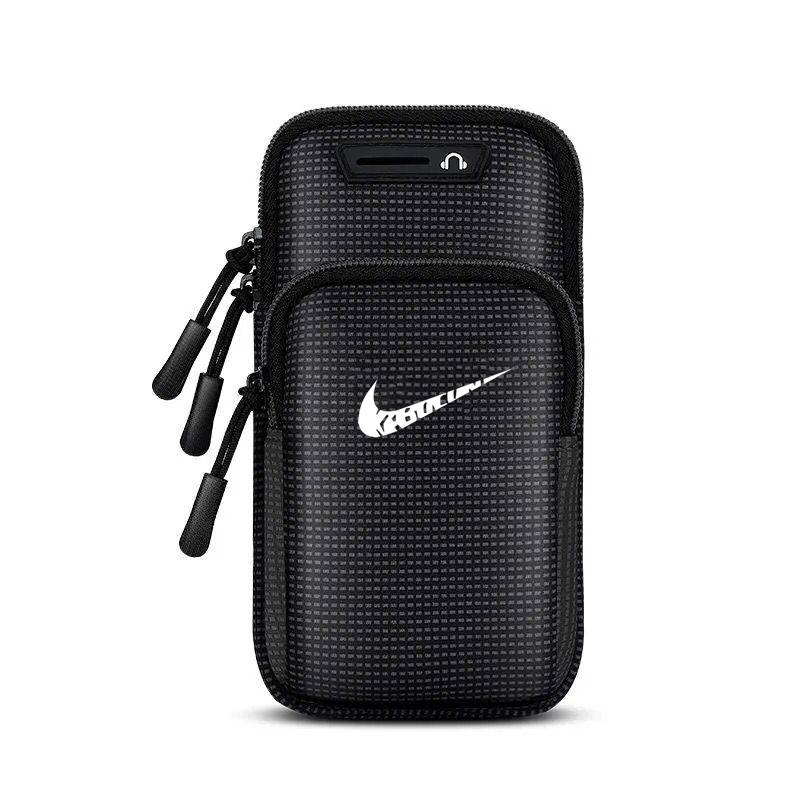 A running mobile arm bag with apples on the outside of the user's gym arm bag for a waterproof wrist