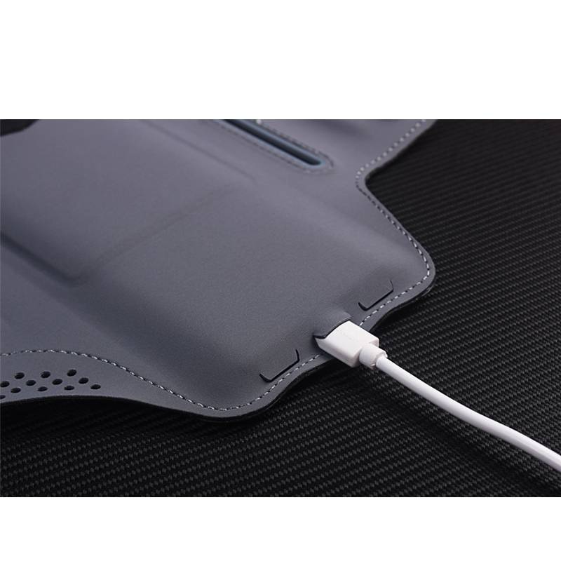 A running cell phone arm bag can touch a woman's arm with a woman's arm