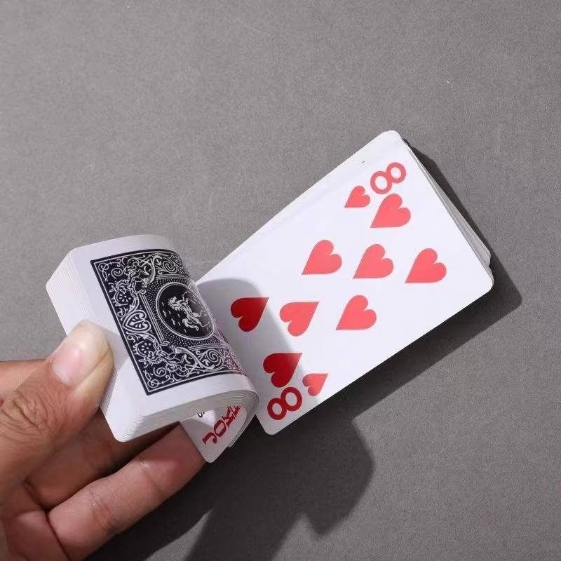 A card-maker at the chess room while he drills
