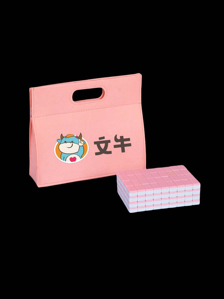 the mini-magic mahjong has a small mahjong in his hand