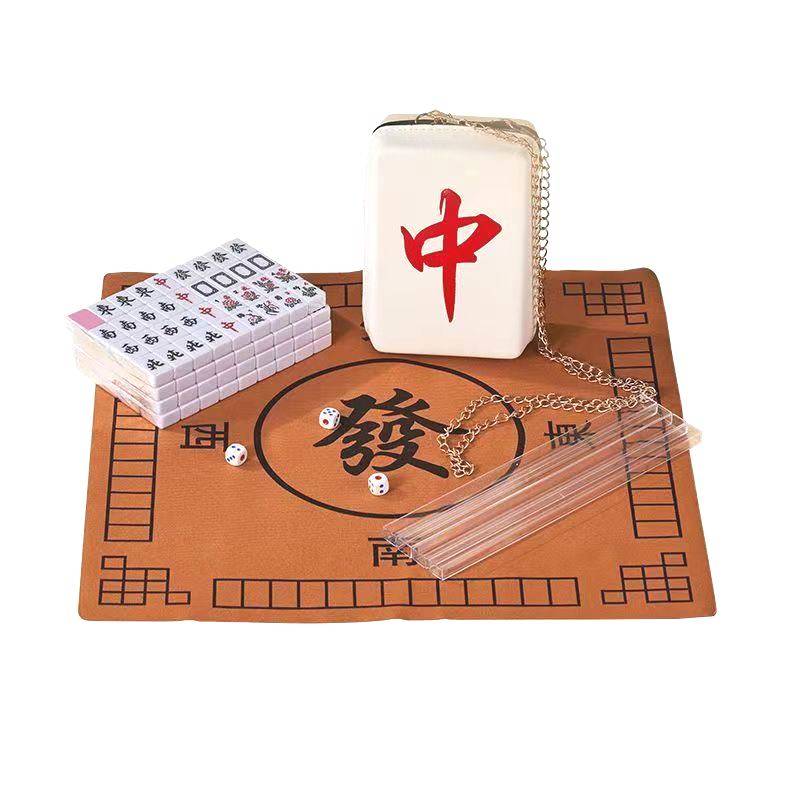 the mini mahjong family travels with a small hand-held, cute mini-mari red mahjong to wrap their hands around little sparrows