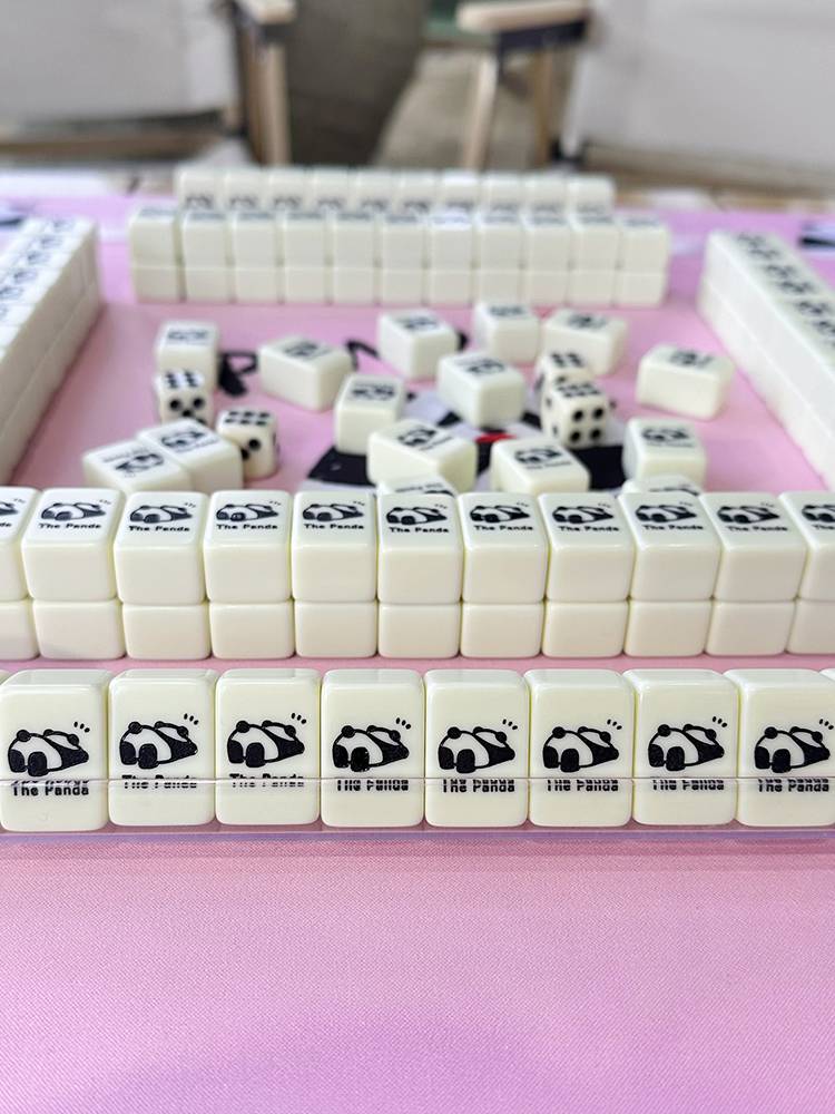 the mahjong mini-ported ivory pandas are cute 26/30 with a mini hand