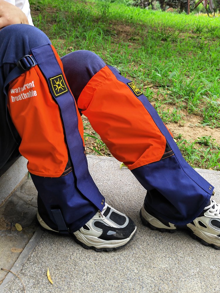 A snow-covered, water-proof, wind-protected-legged man with snow-proof shoes