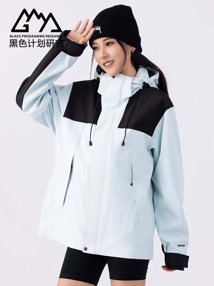 Three times a woman in an outdoor assault suit can take off an American coat and walk up a mountain