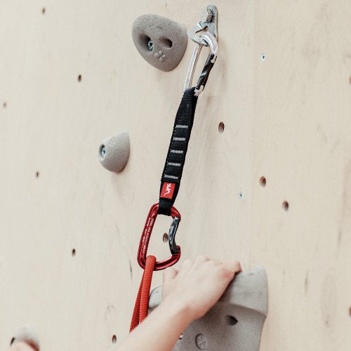 FIXE ROCK CLIMBING FAST-MOUNTED OUTSIDE OF A SPECIALIZED ICE CLIMBING SECURITY TRAINING FACILITY ORION V2