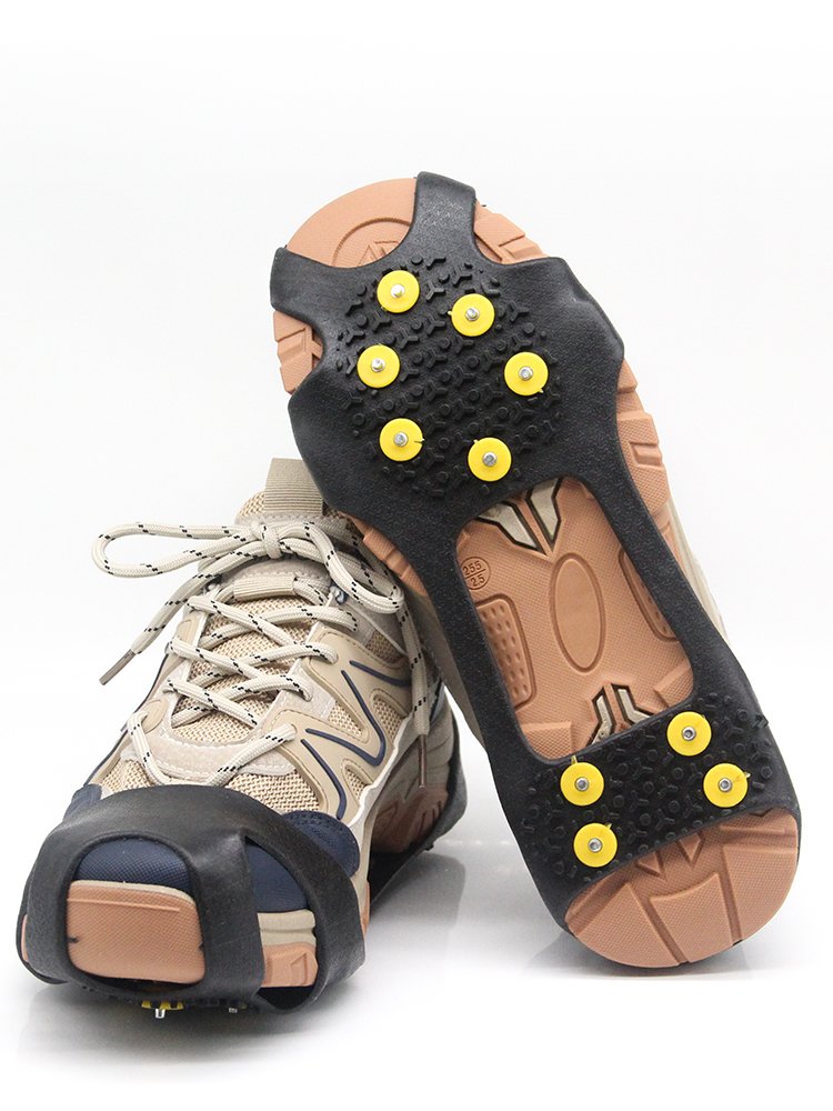 Ice claws and slippers with snowcrawlers and ski soles for winter
