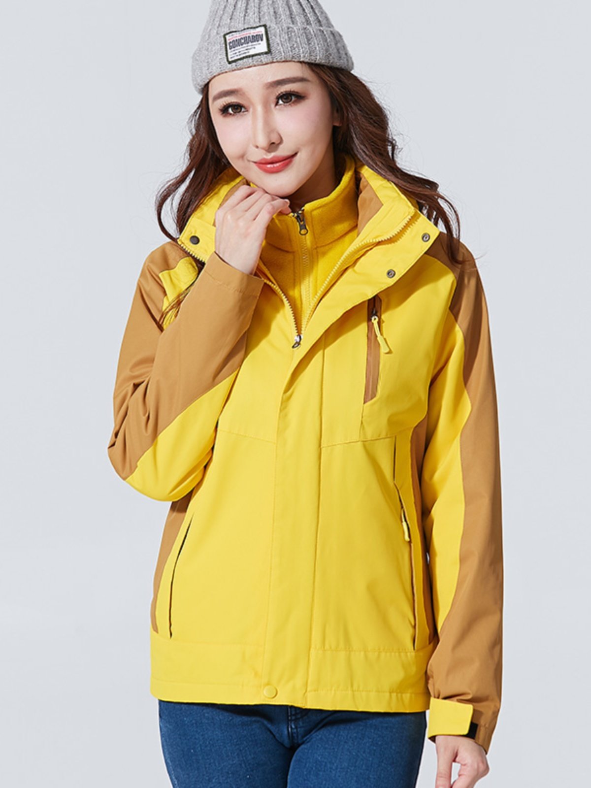 A man and a woman in an assault suit can take off a velvet, windproof and waterproof jacket and climb out the mountain in winter