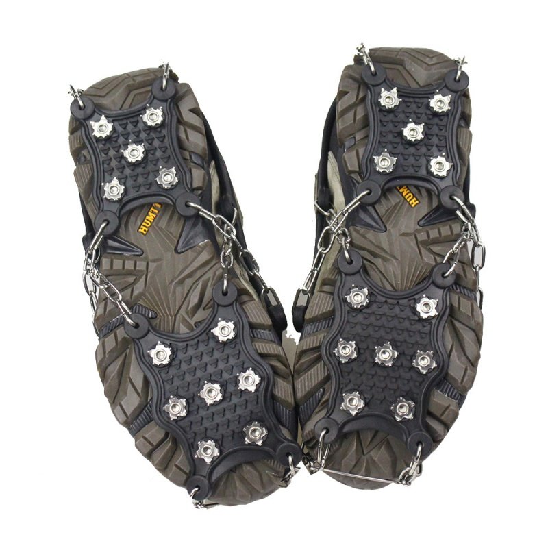 Outdoor mountain climbing with ice-covered ice-crawling shoes, stainless steel rubber climbing on foot