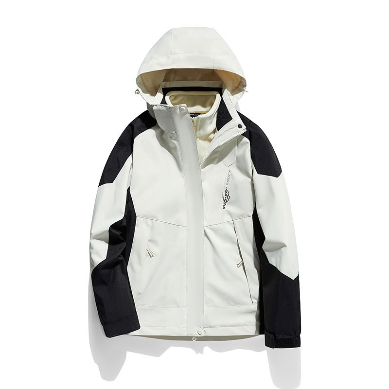 The man with the new camping coat for the autumn and winter went into hiding for the mountaining couple