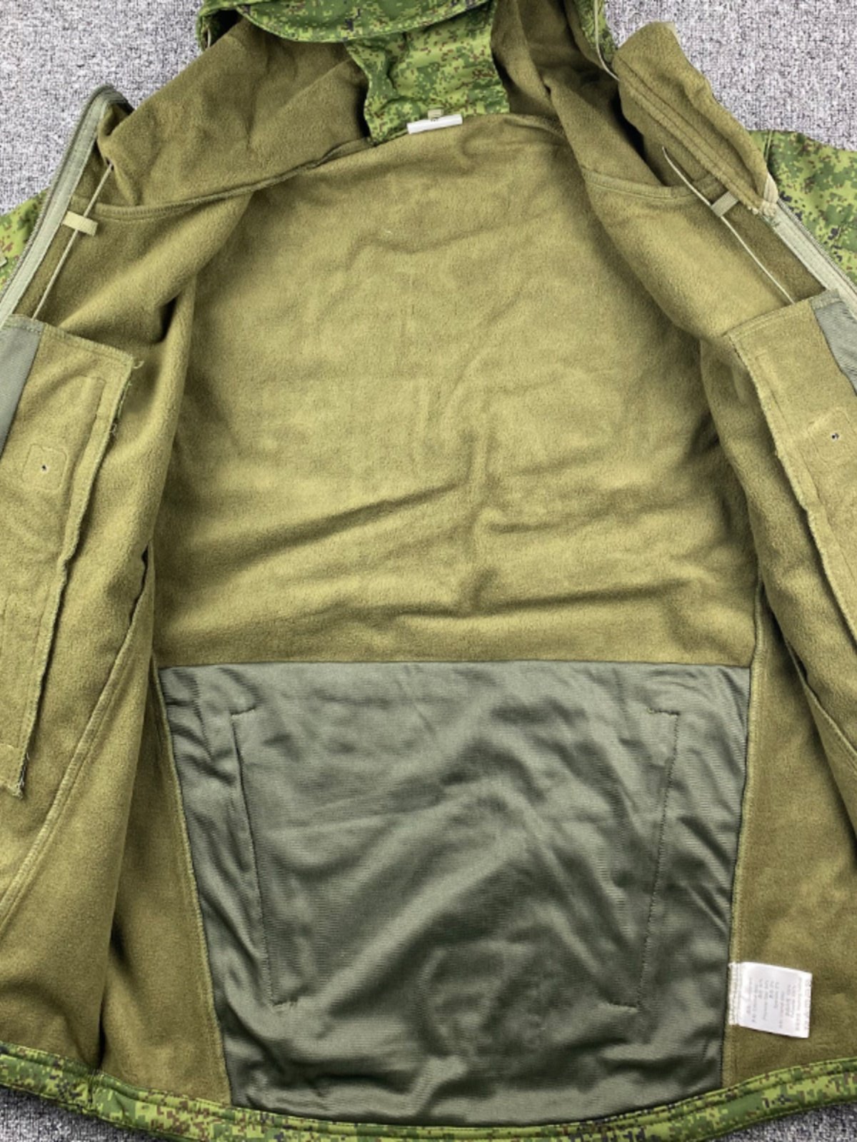 THE RUSSIAN-OWNED EMR CAMOUFLAGE SUIT, THE LITTLE GREEN MAN'S SOFT-SHELL-SKINNED OUTSIDE, HEATED AND WATERPROOF