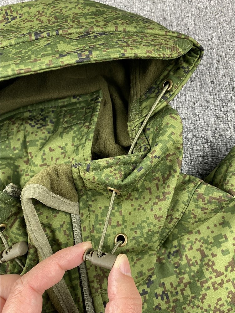 THE RUSSIAN-OWNED EMR CAMOUFLAGE SUIT, THE LITTLE GREEN MAN'S SOFT-SHELL-SKINNED OUTSIDE, HEATED AND WATERPROOF