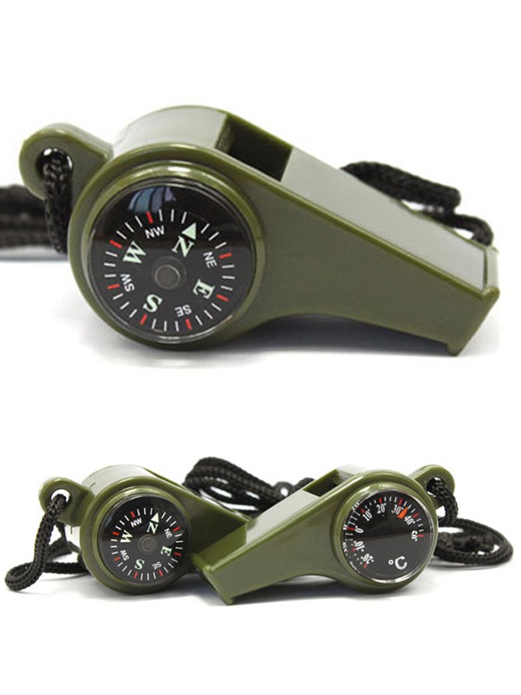 An outdoor three-in-one compass for children with multiple functions points to the north needle thermometer for a whistle