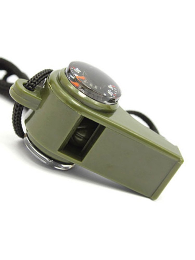 An outdoor three-in-one compass for children with multiple functions points to the north needle thermometer for a whistle