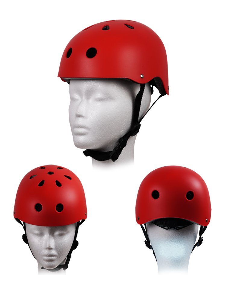 The children's helmets ride their helmets on the children's bicycles in the stream of air drifting through the mountain climbing helmets of adults