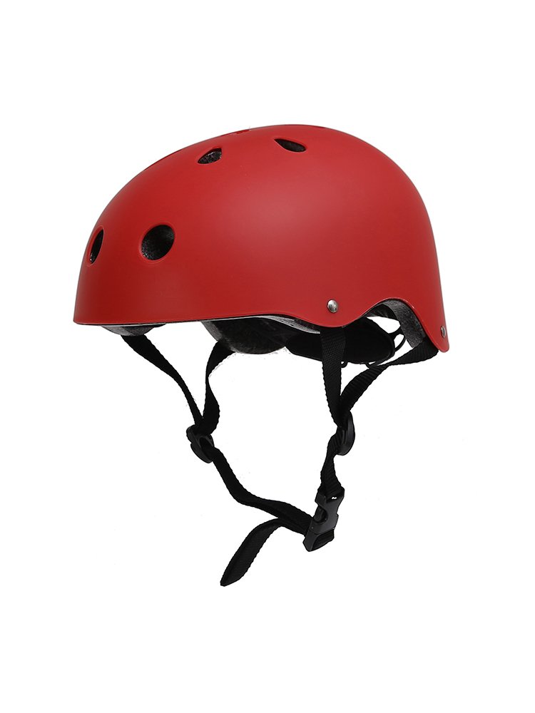 The children's helmets ride their helmets on the children's bicycles in the stream of air drifting through the mountain climbing helmets of adults