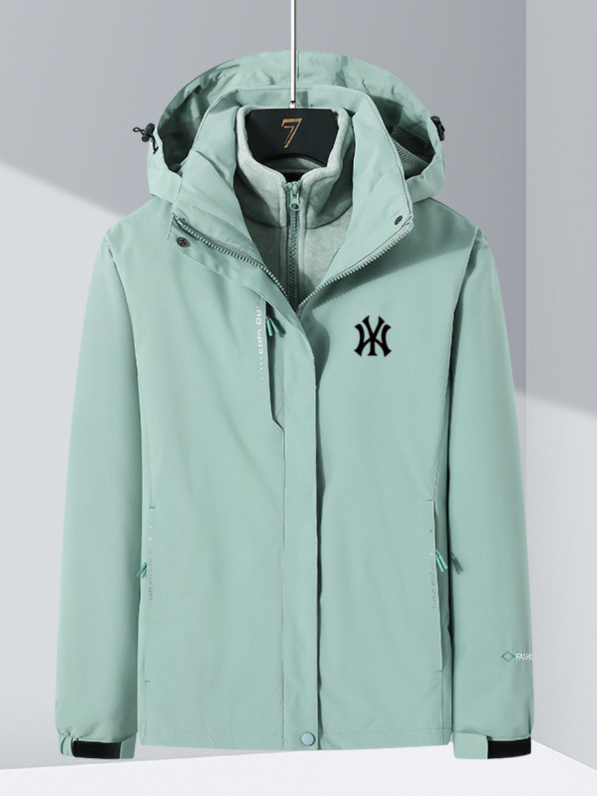 THREE MEN AND WOMEN UNDER THE OFFICIAL NY&WM UNIFORM CAN TAKE OFF THEIR JACKETS 2024 NEW WIND AND WATER TOPS