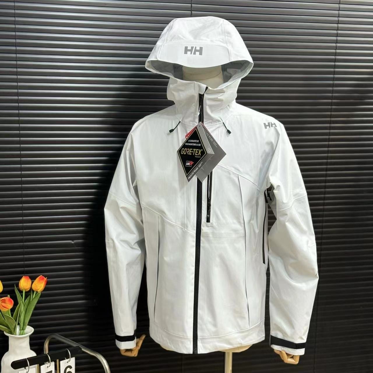 HAYLEY HANSEN'S NEW HARD-SHELL MALE AND FEMALE CO-HATS, SKI-SKI-SKI-SKI JACKET OUTSIDE THE FRONT DOOR