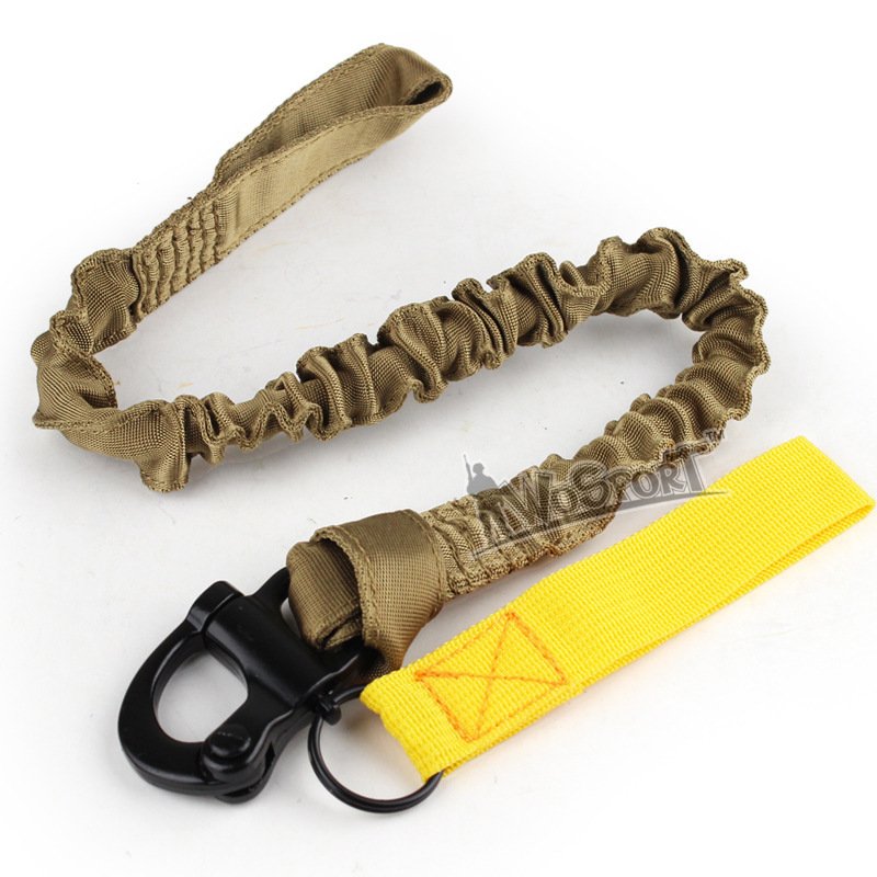 THE OUTSIDE CLIMBER'S C.S. WITH THE GUN AND ROPES DRESSED UP AS A VIDEO-VISION DEVICE WITH A BIG PULL-ON SAFETY ROPE