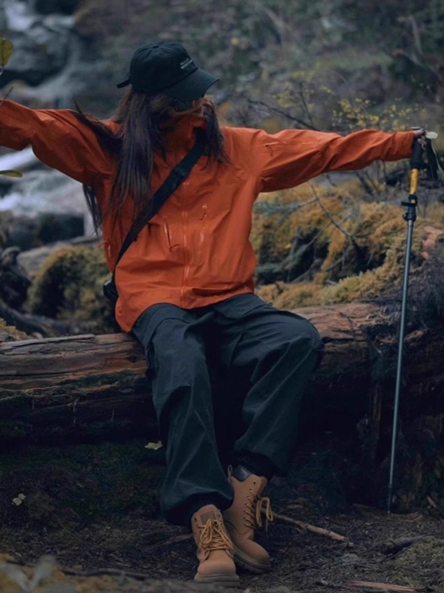 Orange-colored outer-hull assault suit, male and female, wind-proof, water-protected hiking suit, shared with the Tibetan bird family
