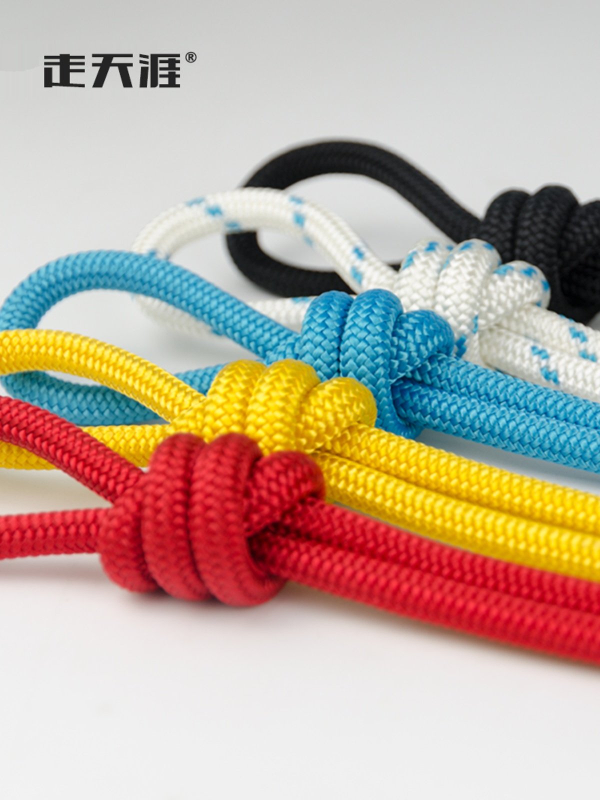 Walking around on a rope, climbing on a rockline umbrella, catching a rope, climbing on a mountain support rope