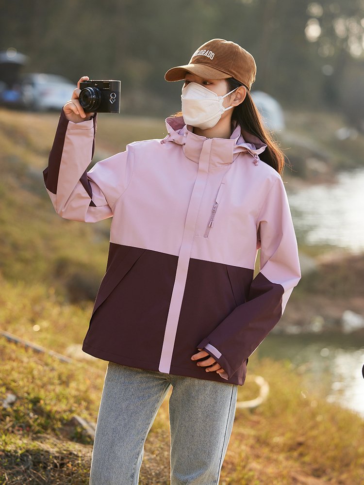 A new 2024 spring-and-a-fall mountain-up suit for a man and a woman in a wind-proof and water-proof jacket