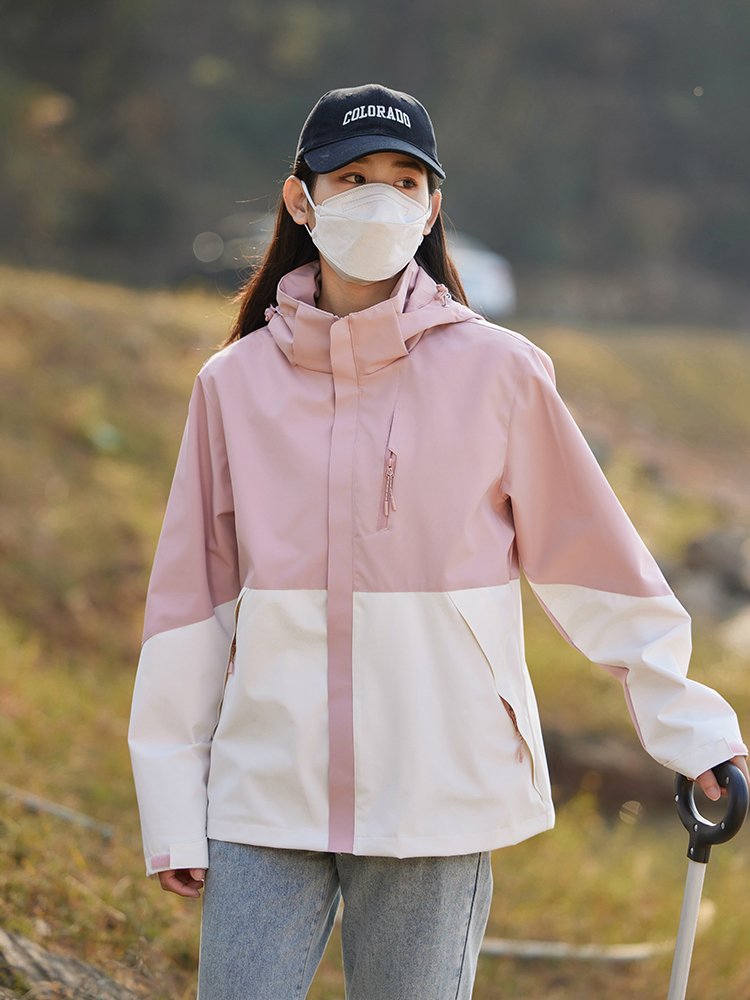 A new 2024 spring-and-a-fall mountain-up suit for a man and a woman in a wind-proof and water-proof jacket