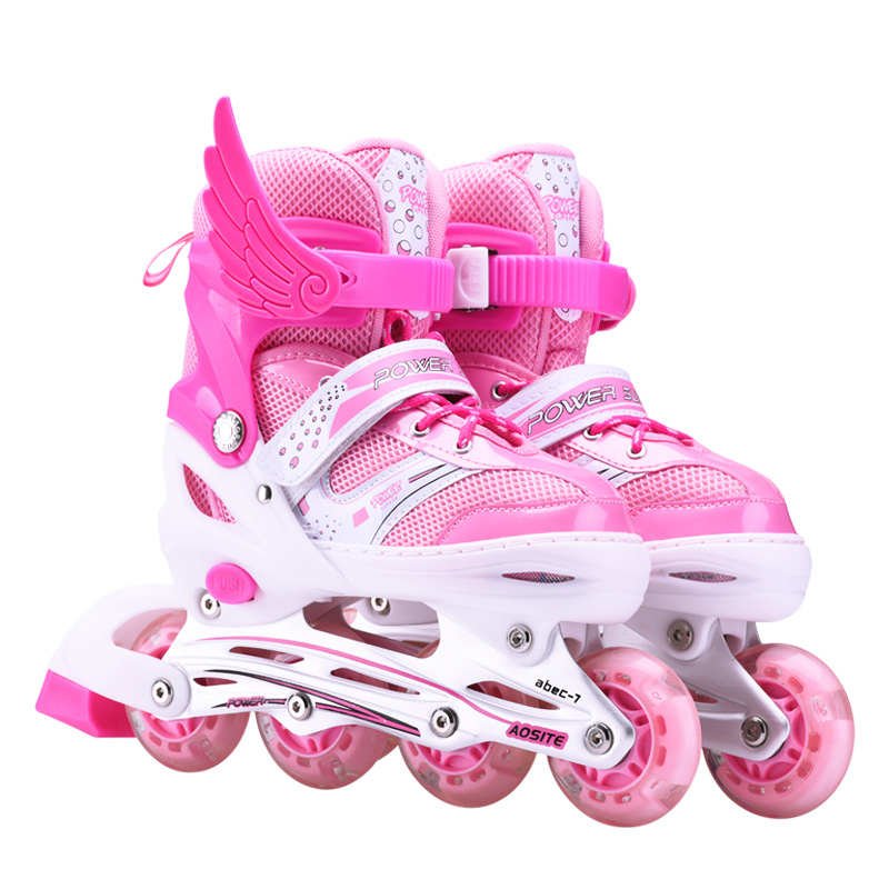 Skating with kids aged 3 to 10 years old, men and women with starters are big