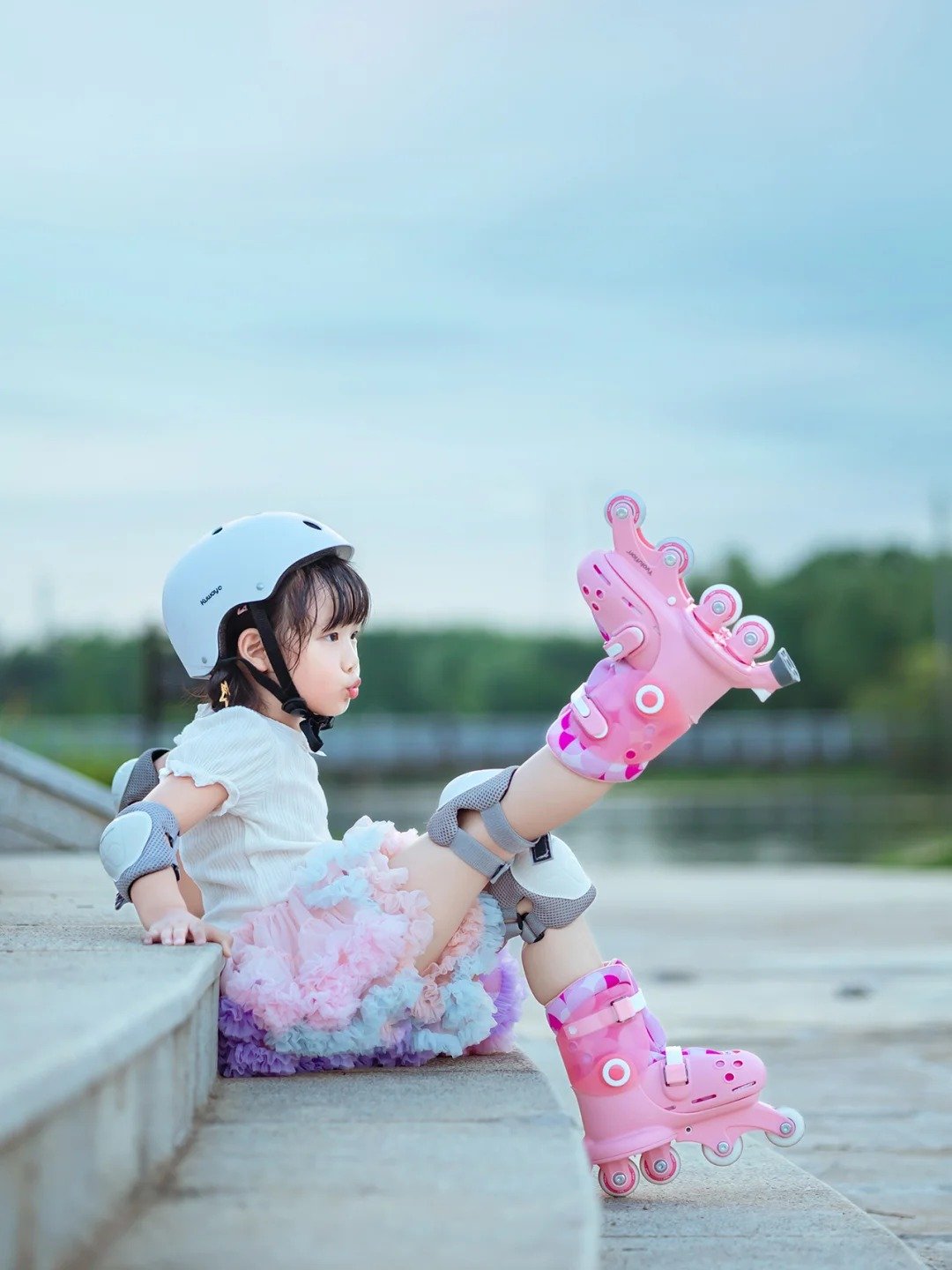 Phil's two-and-a-half-year-old baby skates on a little wheel-sliding slipper