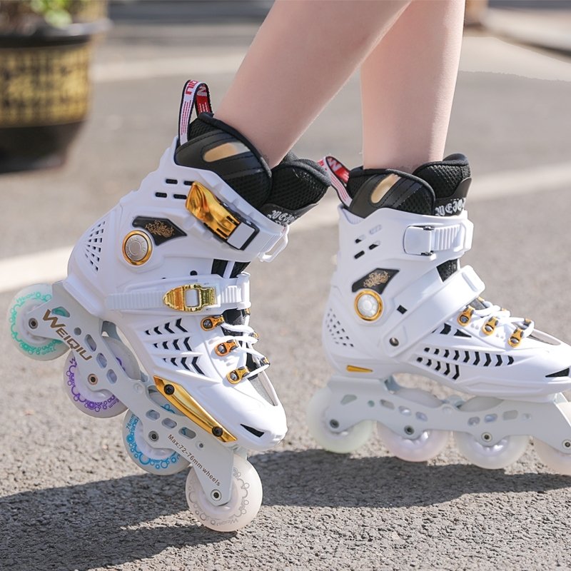 A professional roller skater, an adult with a straight line, a male and a child skater