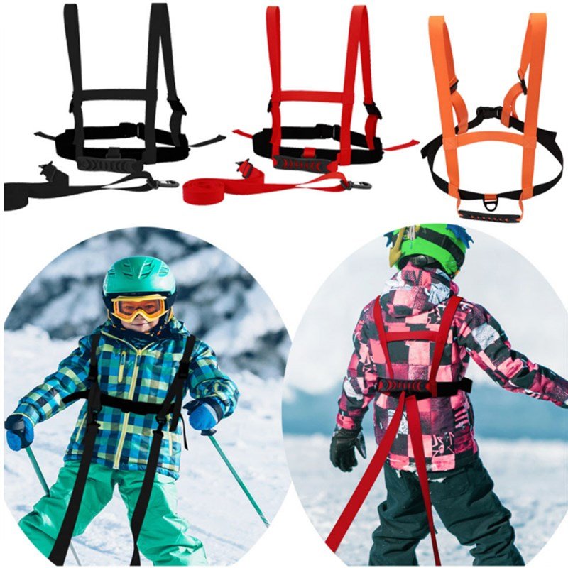 Children skiing ropes with a teaching aid to a child with a safety-protected rope