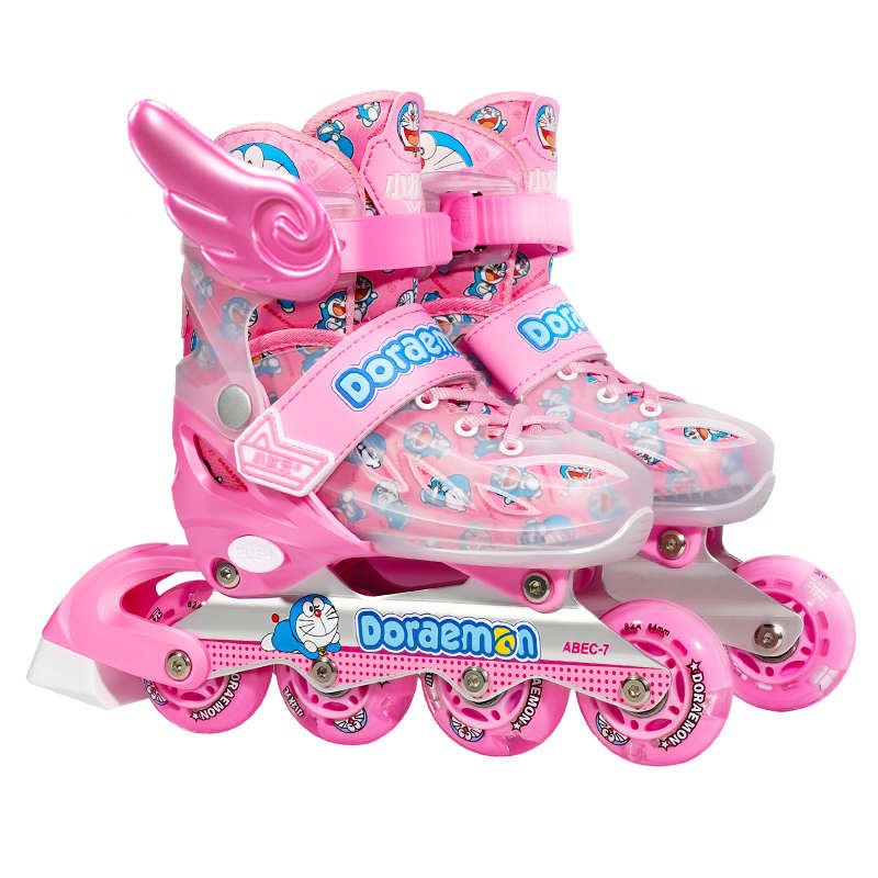 Small skating girls with roller skates and beginner skates