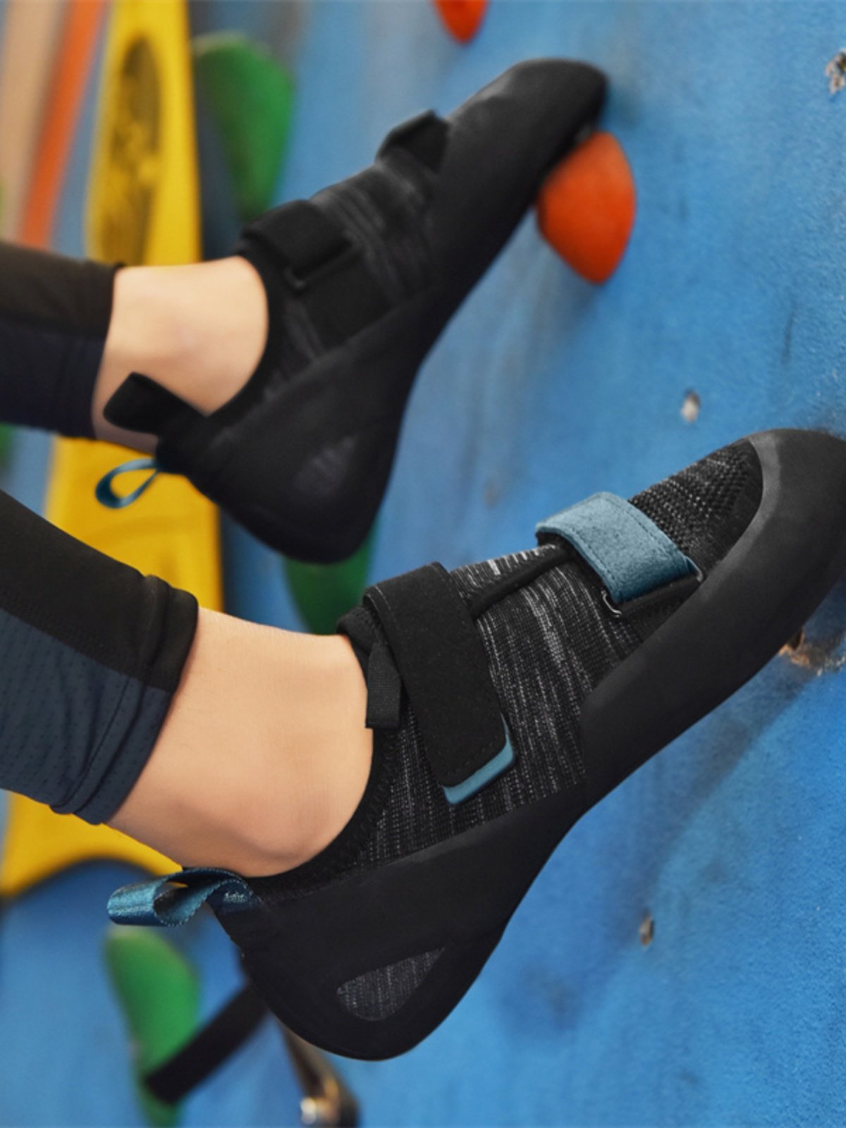 The man and woman in the rock-climbing shoes are trained to climb rock in the field