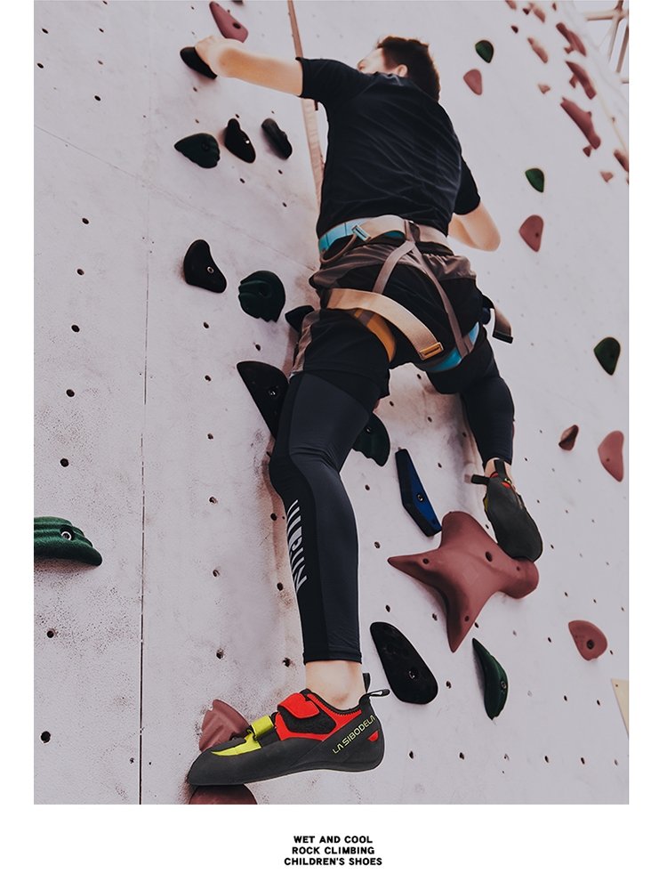 A man and a woman from the room who specializes in rock-climbing shoes, enters the air for a young adult