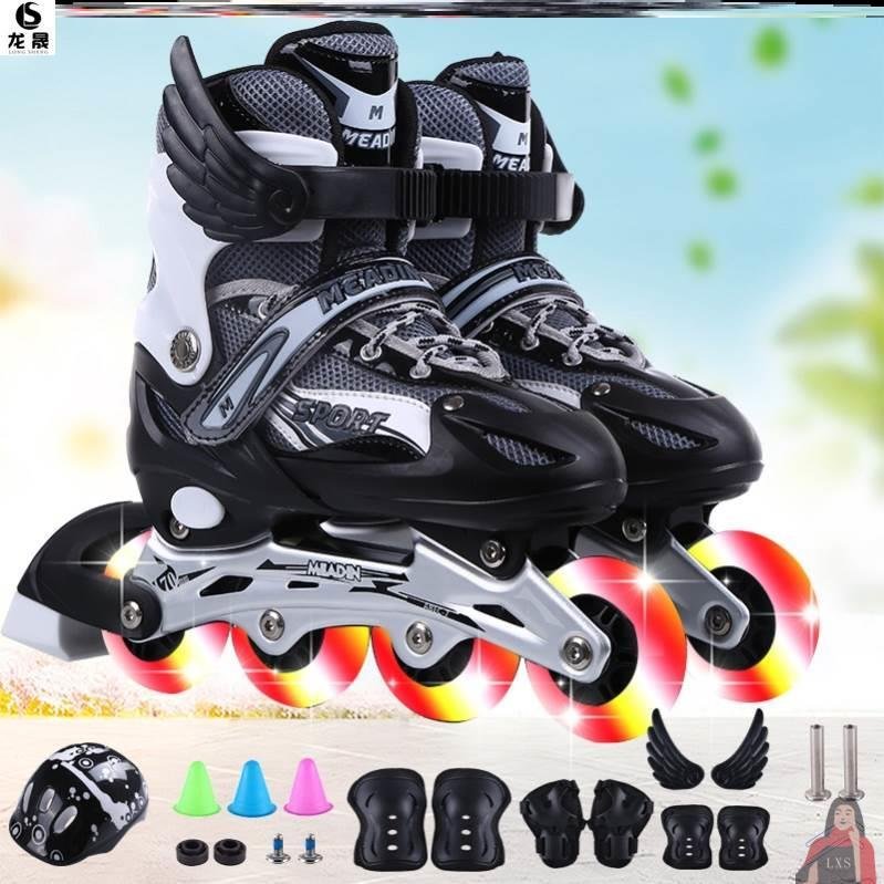 In children, big boys and girls with shoes and skates lined up in four rows, skating and sliding