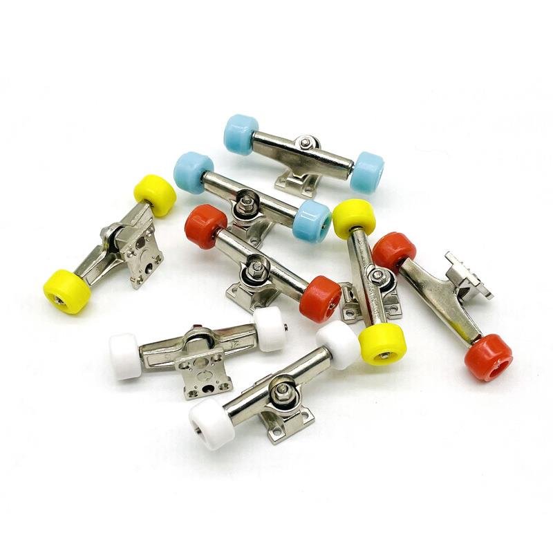 A silver-coloured nickel-plating stub fitting for the finger skater bridge, multi-colored bearing wheel-pumping nut part of the wheel hand
