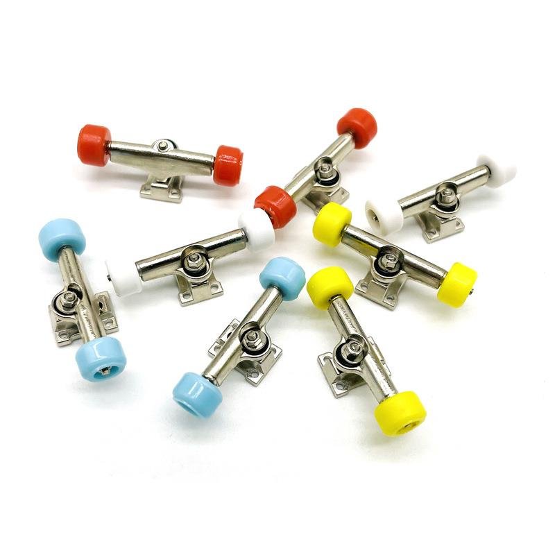 A silver-coloured nickel-plating stub fitting for the finger skater bridge, multi-colored bearing wheel-pumping nut part of the wheel hand