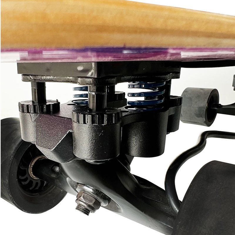AN ELECTRIC SKATEBOARD AGAINST THE BASE OF THE TREMORS