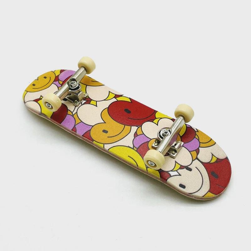 A finger skater's mammoth, two-array skateboards, a professional axle bearing children's toy, a wooden hand skater