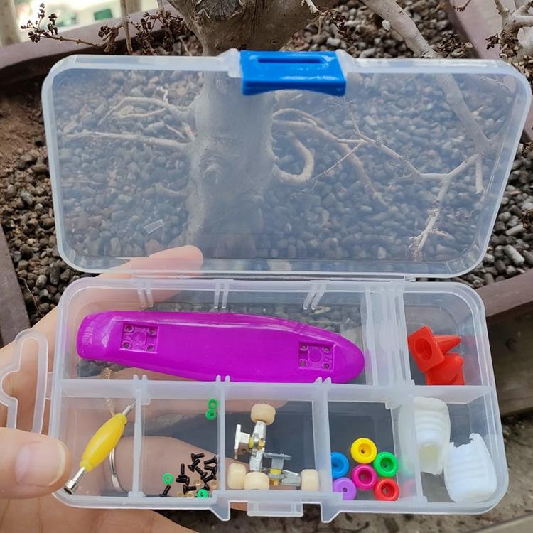 A child's birthday present with two packs of stickers for a toy set with one-fingered fingers