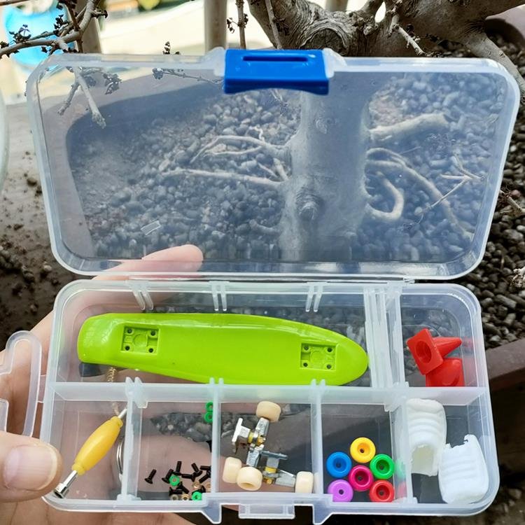 A child's birthday present with two packs of stickers for a toy set with one-fingered fingers