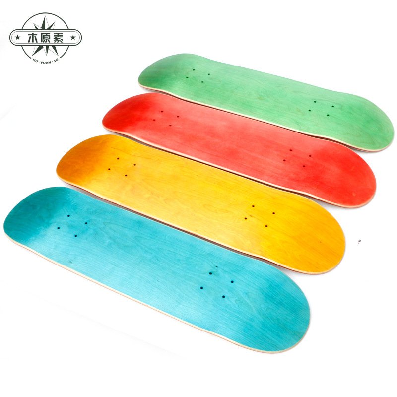 A professional double-coloured slab, four-wheeled skating scholar, an adult male and female, and an adult skating