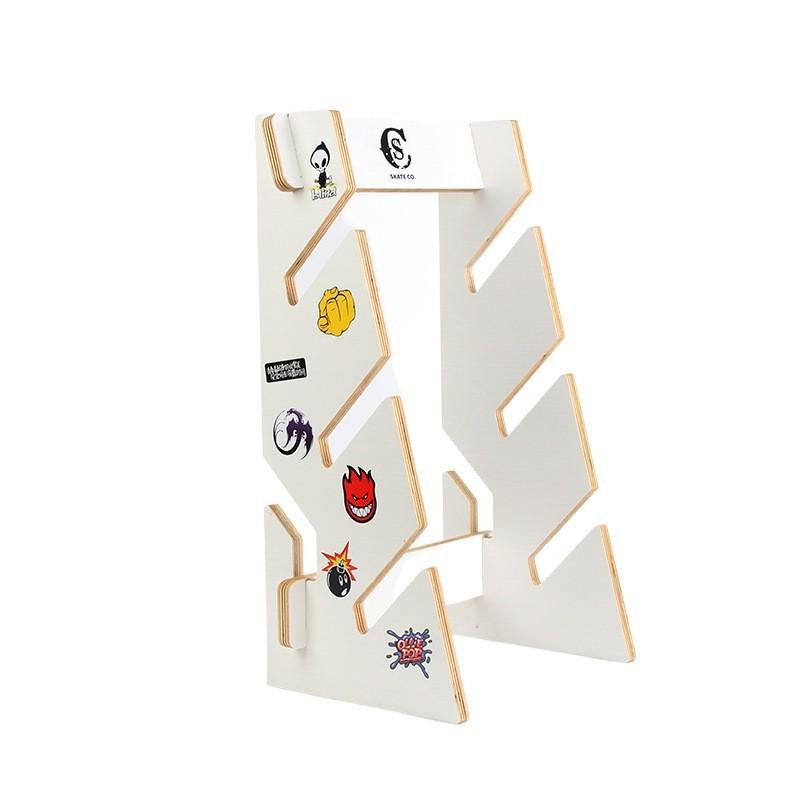 Double skateboards with long-boarded land surfboards re-mounted with multiple layers of solid wood to display the shelf