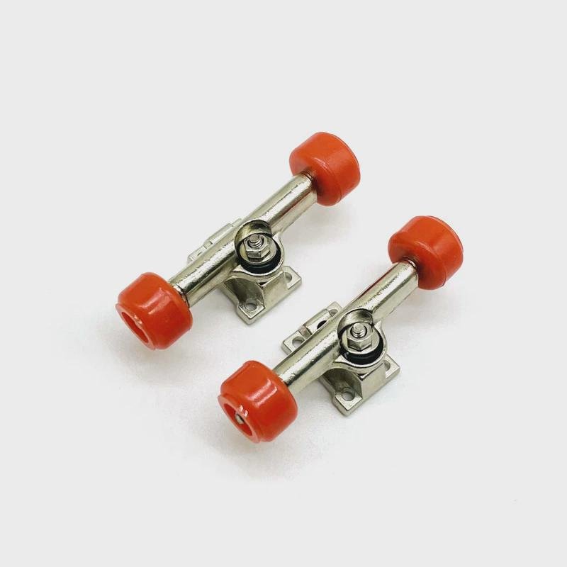 A silver-coloured nickel-plating stub fitting for the finger skater bridge, multi-colored bearing wheel-pumping nut part of the wheel hand